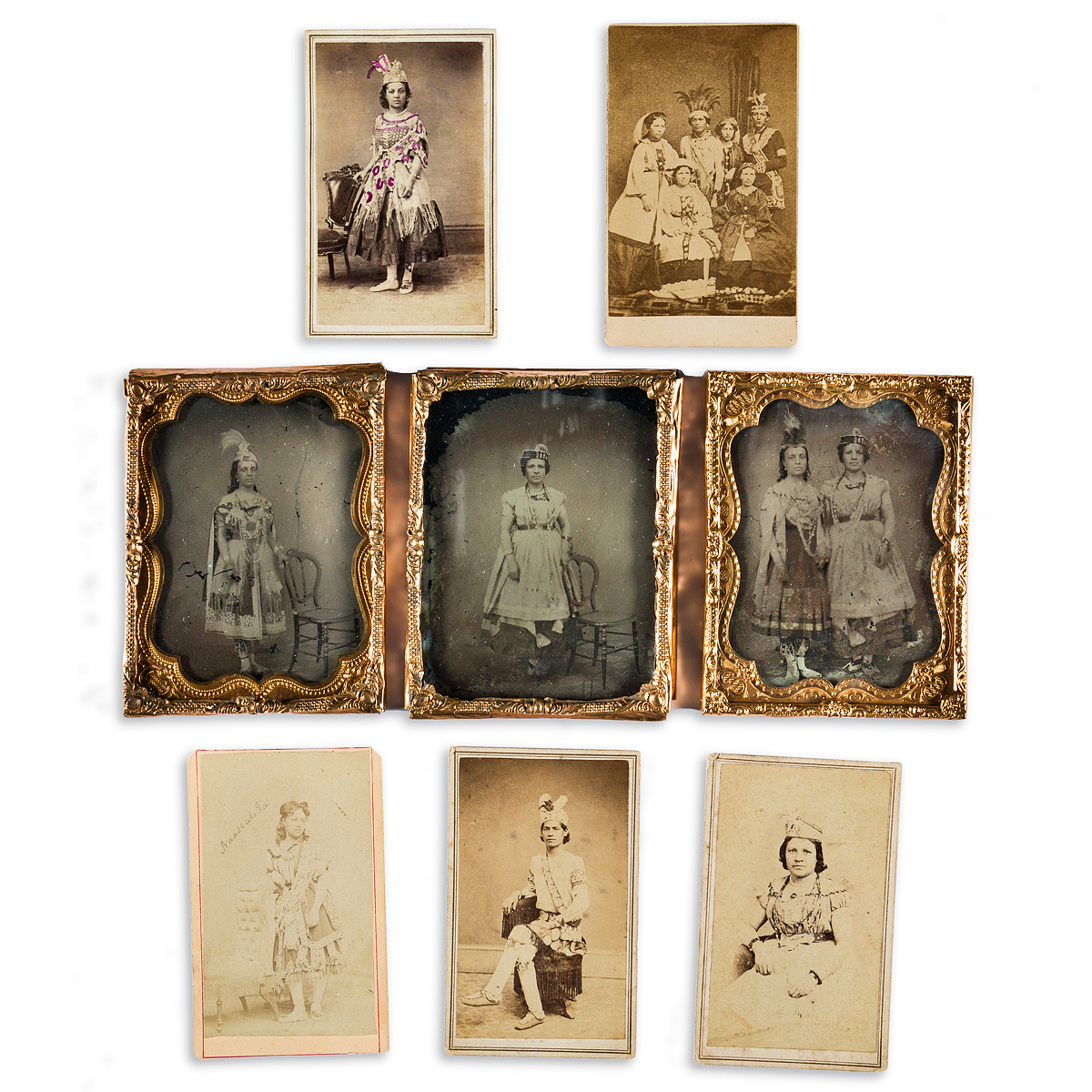 (AMERICAN INDIANS--PHOTOGRAPHS.) Group of 8 photographs of a performing troupe in New York and Canada.